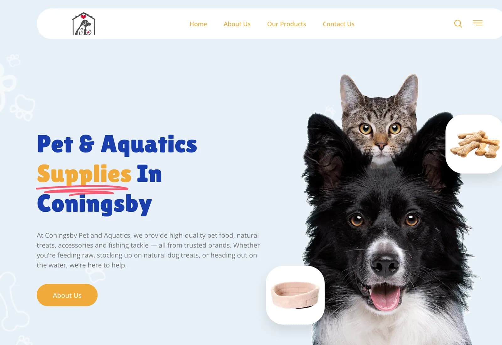 The Coningsby Pet and Aquatics homepage on a desktop browser: the headline “Pet & Aquatics Supplies In Coningsby” beside a photograph of a dog and a cat, with a line about pet food, treats, accessories and fishing tackle.